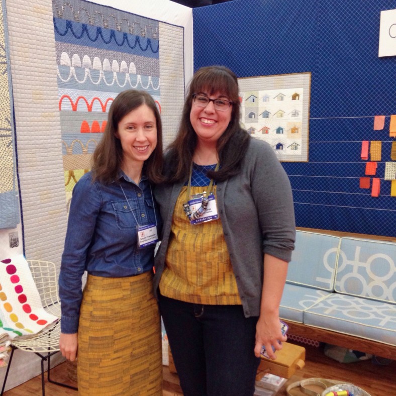 Nichole and Carolyn in Doe Clothes at Quilt Market