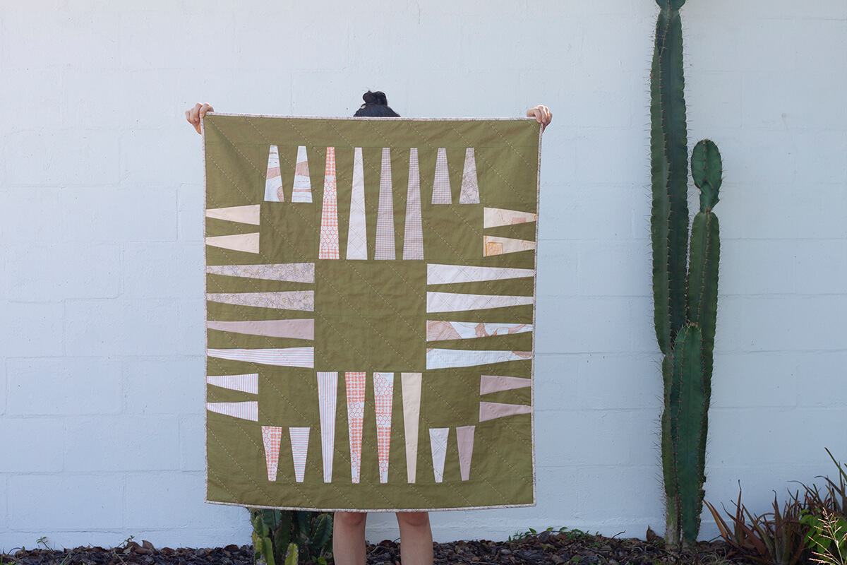 small slash quilt in pink and military green