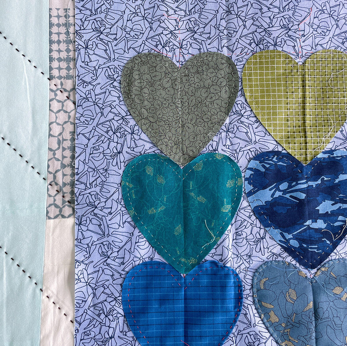 hearts appliqué block in scrappy carolyn friedlander fabrics