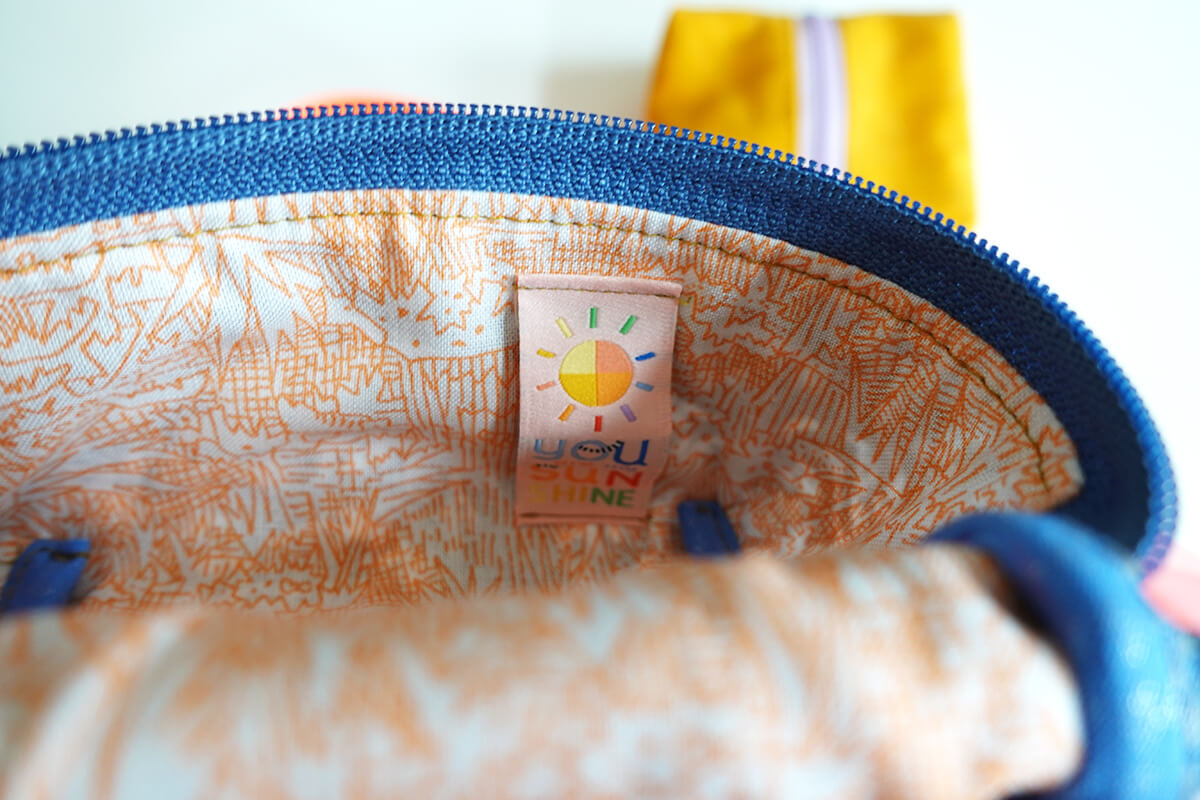 split pouch with woven label