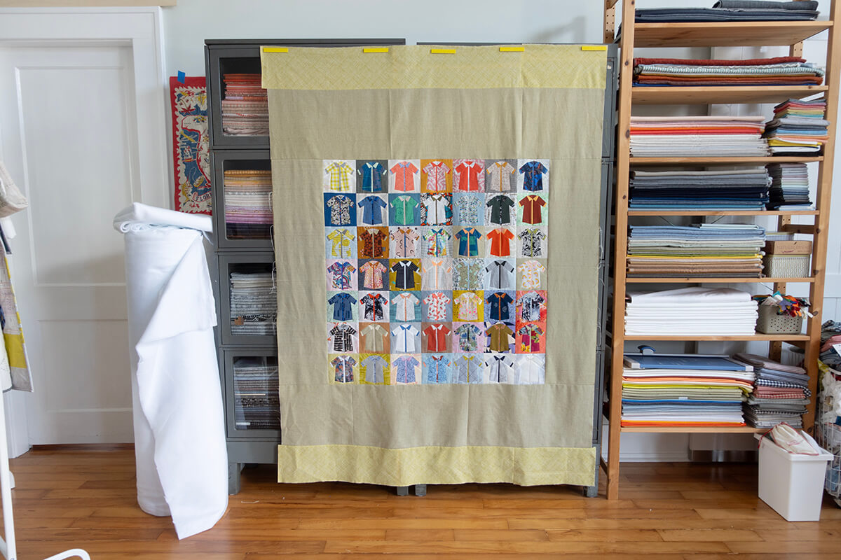 Shirts quilt top sewn together with borders